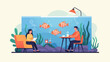 © Nora - Two people relax by an aquarium with fish, plants, and seating