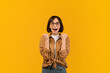 © Prostock-studio - Yes, I did it. Overjoyed caucasian woman gesturing yes in joy celebrating success, standing over yellow background, studio shot. Victory concept