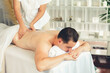 © InfiniteFlow - Caucasian man customer enjoying relaxing anti-stress spa massage and pampering with beauty skin recreation leisure in day light ambient salon spa at luxury resort or hotel. Quiescent