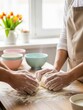 © Alper AI - Two people kneading dough together on a wooden table, flour dusting the surface