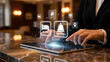© Aruna - Businessperson interacting with modern hotel technology interface on tablet