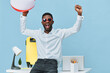 © SHOTPRIME STUDIO - Lively happy cheerful man with sunglasses celebrating success in bright office studio with colorful accessories, holding a beach ball and smiling broadly. Casual style, positive vibe, modern workspace