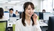 © Creative AI Studio - オフィスでヘッドセットをつけて電話対応をする笑顔の日本人女性オペレーター、カスタマーサポート