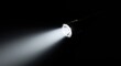 © สิริวุฒิ นาคโคตร - An intense beam of white light emanating from a metallic flashlight, cutting through the deep surrounding darkness and shadows ,battery ,directional ,electric