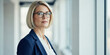 © CoreVisuals - Portrait arm business businesswoman businessperson with happiness woman office job career ceo pride crossed smile female face goggles elderly confident entrepreneur people alone senior person men