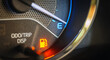 © NARONG - Low Fuel Warning Light on car Dashboard Display