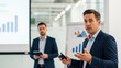 © hafiz - Businessman delivering presentation in a modern office environment