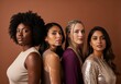 © Meow Creations - Diverse group of four women with different ethnicities and skin types standing together in a studio