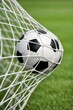 © Pixelmagic - Soccer Ball in Goal Net After Scoring