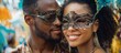 © tetxu - Joyful african couple celebrating at vibrant carnival festival event, Mardi Gras