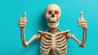 © BlackBird Studio - Skeleton Making Thumbs Up Gesture Against Turquoise Background