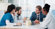 © SparkPix/peopleimages.com - Businessman, doctors and nurse with meeting in hospital for research grant, vaccine trial or planning. Healthcare, people or staff with update on medical funding, investment opportunity or discussion