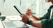 © SnapK/peopleimages.com - Person, hands and writing in office with tablet, laptop and idea planning for web design company. Digital designer, man and creativity in workplace with tech, site testing and stylus for project.