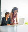 © peopleimages.com - Business, woman or mentor with advice on laptop for corporate training, account question or help. Team, finance intern or manager with tech in office for budget feedback, learning process or support
