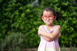 © sripfoto - portrait of a little girl in green park