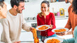 © Davide Angelini - Happy group of friends eating pasta at home dinner party - Cheerful young people having lunch break together - Life style concept with guys and girls celebrating thanksgiving - Bright filter