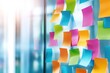 © dashtik - Colorful sticky notes on glass wall for creative office planning and idea organization