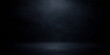© MdShakibAhamed - Dark blue grunge background with a central spotlight effect on a vintage textured concrete wall surface featuring an empty black chalkboard pattern and subtle smoke design