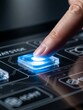© Tiana_Geo - Finger touching a glowing blue square button on a futuristic digital interface with circuit board lines. Concept of high technology, innovation, access control, and virtual connection.