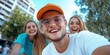 © LifeMedia - Friends capturing fun moments at the skate park on a summer weekend