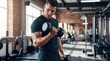 © SnapNshine - Muscular man with intense concentration performs a bicep curl using heavy black dumbbells inside a rustic, industrial-style weight room with exposed brick.