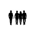© HASSAN - Black silhouettes of four people walking together