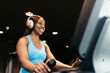 © ADDICTIVE STOCK - Woman enjoying fitness training at the hotel gym