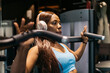 © ADDICTIVE STOCK - Woman using hotel gym exercise equipment