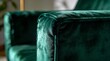 © OmniVisual Studio - Macro detail of plush emerald green velvet sofa texture and elegant stitching.