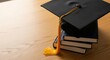 © antuanetto - Academic graduation cap with a golden tassel atop stacked books, symbolizing the journey towards college admissions, education, and future success concept.