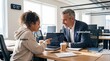 © Bounpaseuth - Multi-Generational Team: A 20-year-old Gen Z intern explaining a concept on a laptop to a 60-year-old senior executive, both smiling, mutual respect, mentorship.