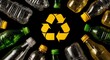 © Julia - The recycling symbol is surrounded by plastic bottles placed in a circle against a dark background