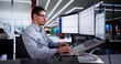 © Andrey Popov - Man Using Online Document Management Software