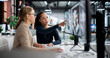 © Andrey Popov - Female GIS Engineer Uses 3D Software