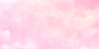 © Daiyan - A soft and gentle pink background with a blurred cloudy watercolor texture evoking a sense of calm and serenity