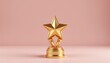© K-MookPan - Gold Star Trophy on Pink Background Symbolizing Achievement and Success in Awards Ceremonies