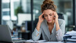 © Laura - Businesswoman under stress from excessive work in office, professional experiencing workplace pressure, too much work situation, office stress scene, overwhelmed female employee,