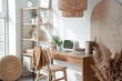 © Pixel-Shot - Interior of light home office with workplace, wooden shelf unit and plants
