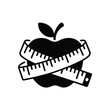 © firoj - Apple with a measuring tape wrapped around it symbolizing health