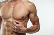 © Maryna - Muscular man shows toned abs and chest muscles. He poses shirtless showing lean physique. Bodybuilder flexes biceps and pectoral muscles. Athlete displays strong body.