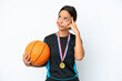 © luismolinero - Young basketball player woman isolated on white background having doubts and thinking