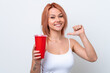 © luismolinero - Young Russian woman holding soft drink isolated on white background proud and self-satisfied