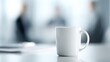 © Firadoaw - Calm professional office scene with sharp focus on a white coffee mug on desk, colleagues softly blurred in background