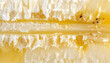© Diki - Extreme Close up of ripe yellow banana peel texture with sweet flesh showing fibrous strands and small dark seeds in bright natural light