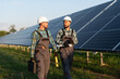 © Serhii - Engineers inspecting solar panels at renewable energy farm