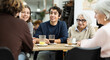 © JackF - Multi-age group of people in restaurant. Organization of meetings, coffee breaks, and festive dinners, family gatherings. Relatives chatting, joking, speaking, have nice conversation, enjoy meeting