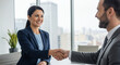 © gabriel - Business Professionals Shaking Hands in Office with City View
