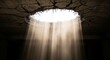 © Aoao - Sunlight streaming through a circular hole in a cracked concrete ceiling. Concept of hope, divine inspiration, liberation, and finding a spiritual breakthrough in a dark industrial space.