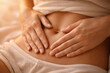 © praewpailyn - Woman stomach pain abdomen myoma uterine fibroids endometrial polyp health Woman holds lower stomach soft light suggesting abdominal pain from myoma uterine fibroids endometrial polyp and intimate