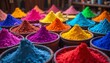© Aliona - Vibrant colorful powders in bowls at a market stall for Holi festival